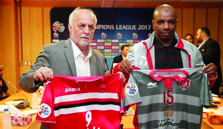 Lekhwiya and Persepolis officials display team jerseys ahead of their AFC Champions League Round of 16 clash.