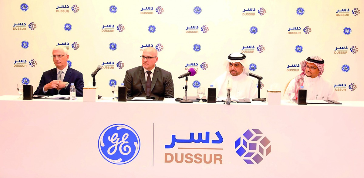 Abdullatif bin Ahmed Al Othman, Chairman of Dussur, and other senior officials of GE at the signing ceremony held in Riyadh recently. 