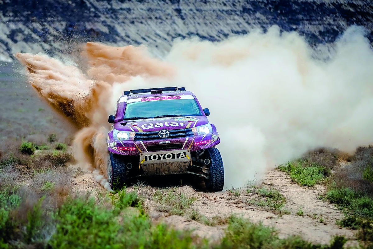 Qatar's Nasser Saleh Al Attiyah and his navigator Matthieu Baumel of Toyota Hilux Overdrive team in action during the fifth stage of Rally Kazakhstan yesterday. TOP: Saudi Arabia’s Yazeed Al Rajhi  in action during yesterday's fifth stage.