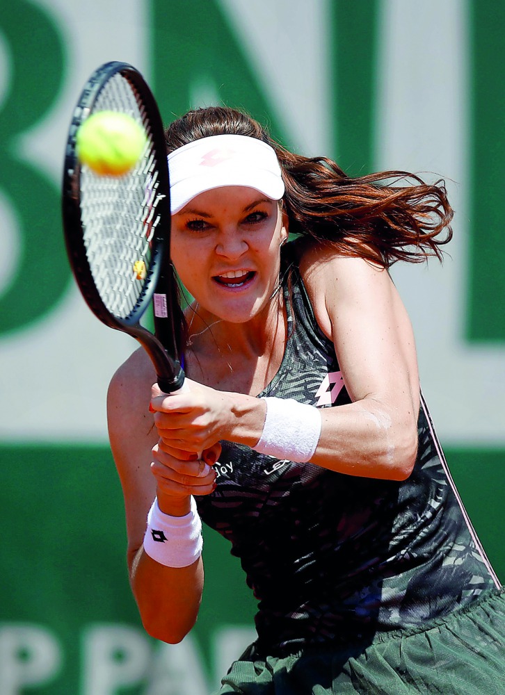Poland's Agnieszka Radwanska in action during her second round match against Belgium's Alison Van Uytvanck at the Roland Garros 2017 French Open yesterday. Radwanska won 6-7(3/7), 6-2, 6-3 to advance to the third round.