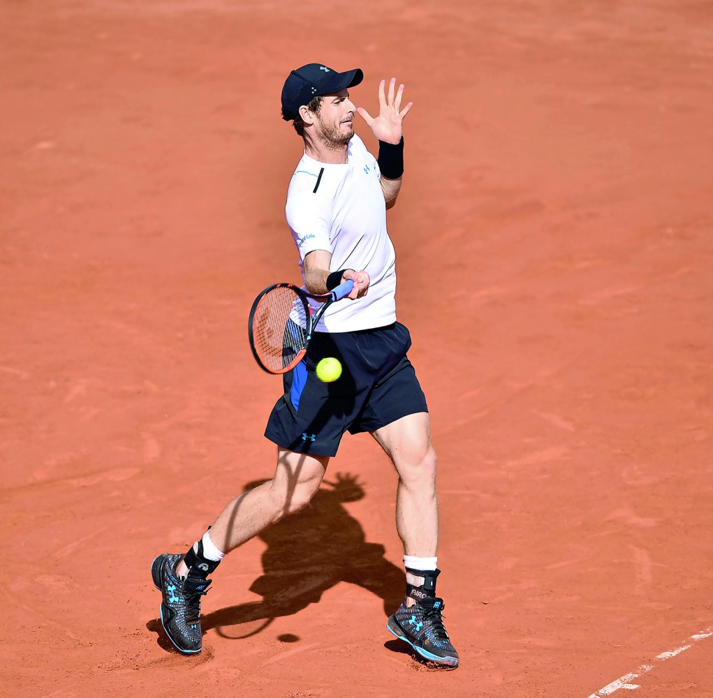 Andy Murray in action during quarter-finals at the Roland Garros.