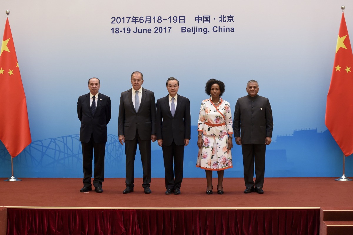 Brazil's Foreign Minister, Aloysio Nunes (left), Russia's Foreign Minister Sergei Lavrov (second left), South Africa's Foreign Minister, Maite Nkoana-Mashabane (second right), and Indian Minister of External Affairs, Vijay Kumar Singh (right) pose with Ch