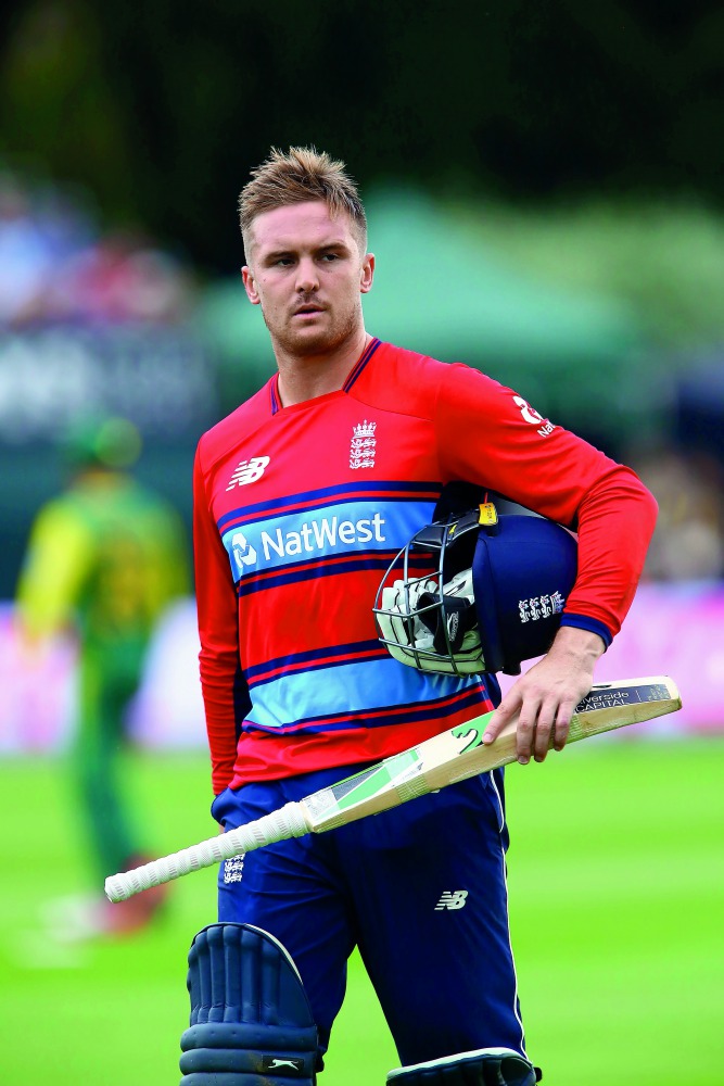 England's Jason Roy walks back to the pavilion after being given out 'obstructing the field' on Friday.