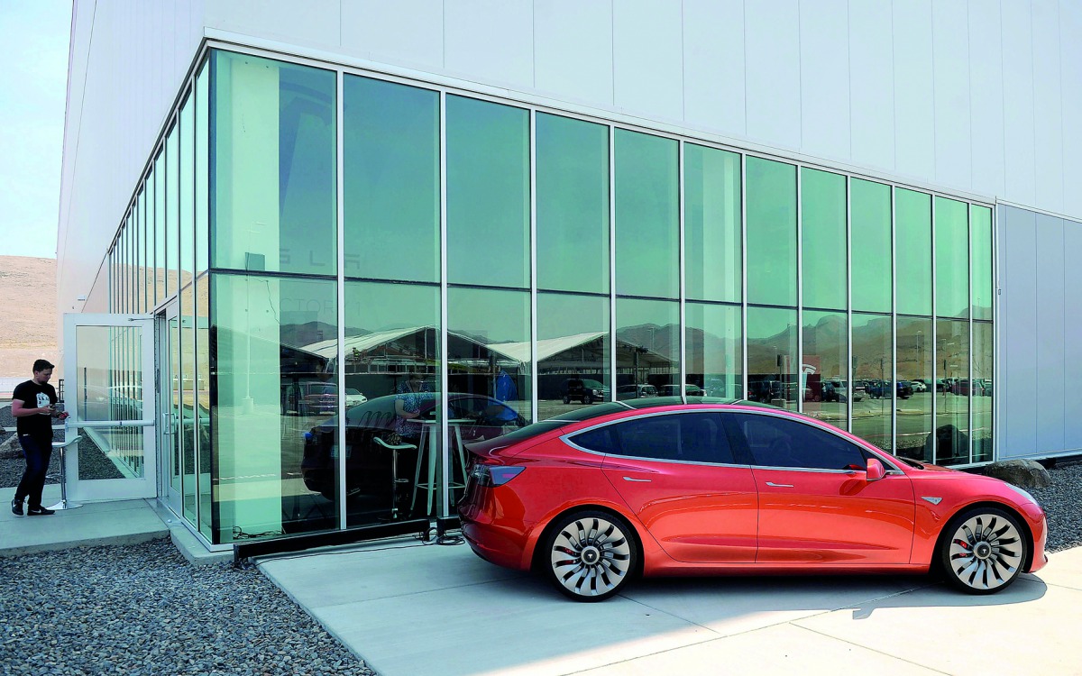 A prototype of the Tesla Model 3 on display in front of the Tesla Gigafactory which will produce batteries for the electric carmaker in Sparks, Nevada,US