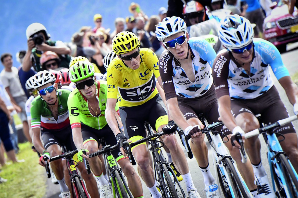 From left: Italy’s Fabio Aru, Colombia’s Rigoberto Uran, Great Britain’s Chris Froome wearing the overall leader’s yellow jersey, France’s Romain Bardet and France’s Alexis Vuillermoz ride in a breakaway during the 189,5 km fifteenth stage of the 104th ed
