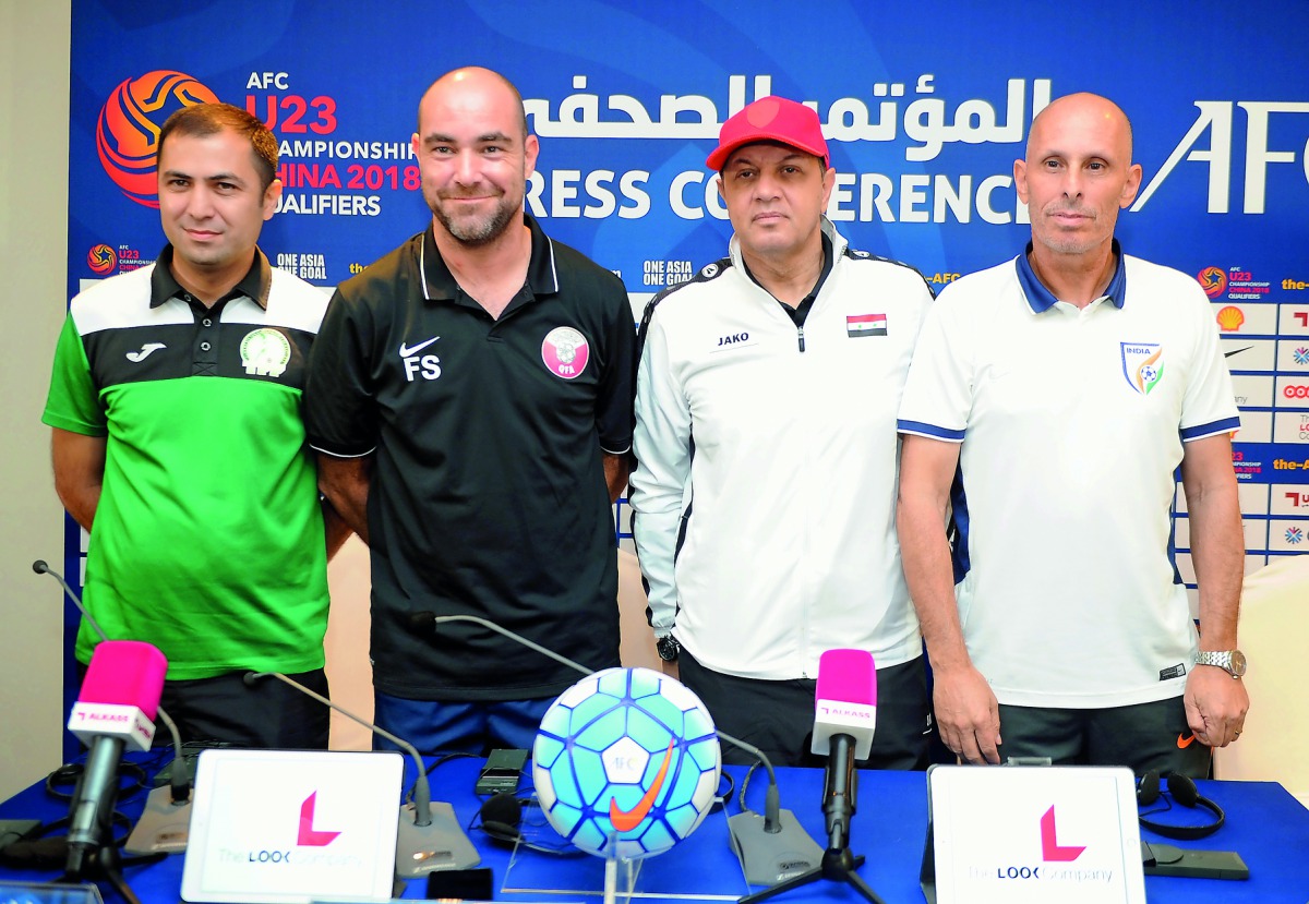 From left: Head coaches of under-23 teams, Agamyradov Ahmet of Turkmenistan, Felix Sanchez of Qatar, Hussein Afash of Syria and Stephen Constantine of India pose for a photograph following a press conference held in Doha ahead of the of AFC U-23 Champions