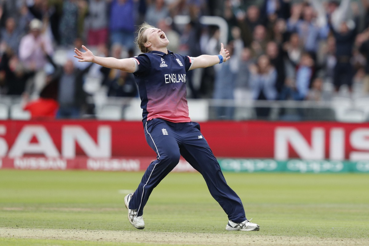 England's Anya Shrubsole celebrates as she takes the wicket of India's Rajeshwari Gayakwad to win the ICC Women's World Cup cricket final between England and India at Lord's cricket ground in London on July 23, 2017. AFP / Adrian Dennis