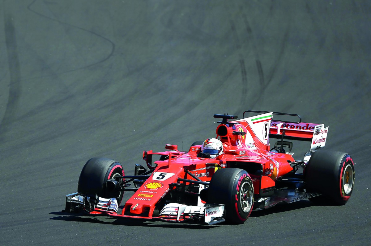 Ferrari’s German driver Sebastian Vettel races during the Hungarian GP in Budapest yesterday. 