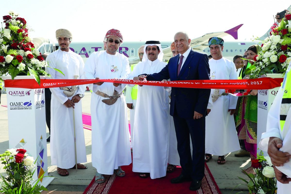 Qatar Airways and Omani officials at the launch of the flight to Sohar in Oman. 