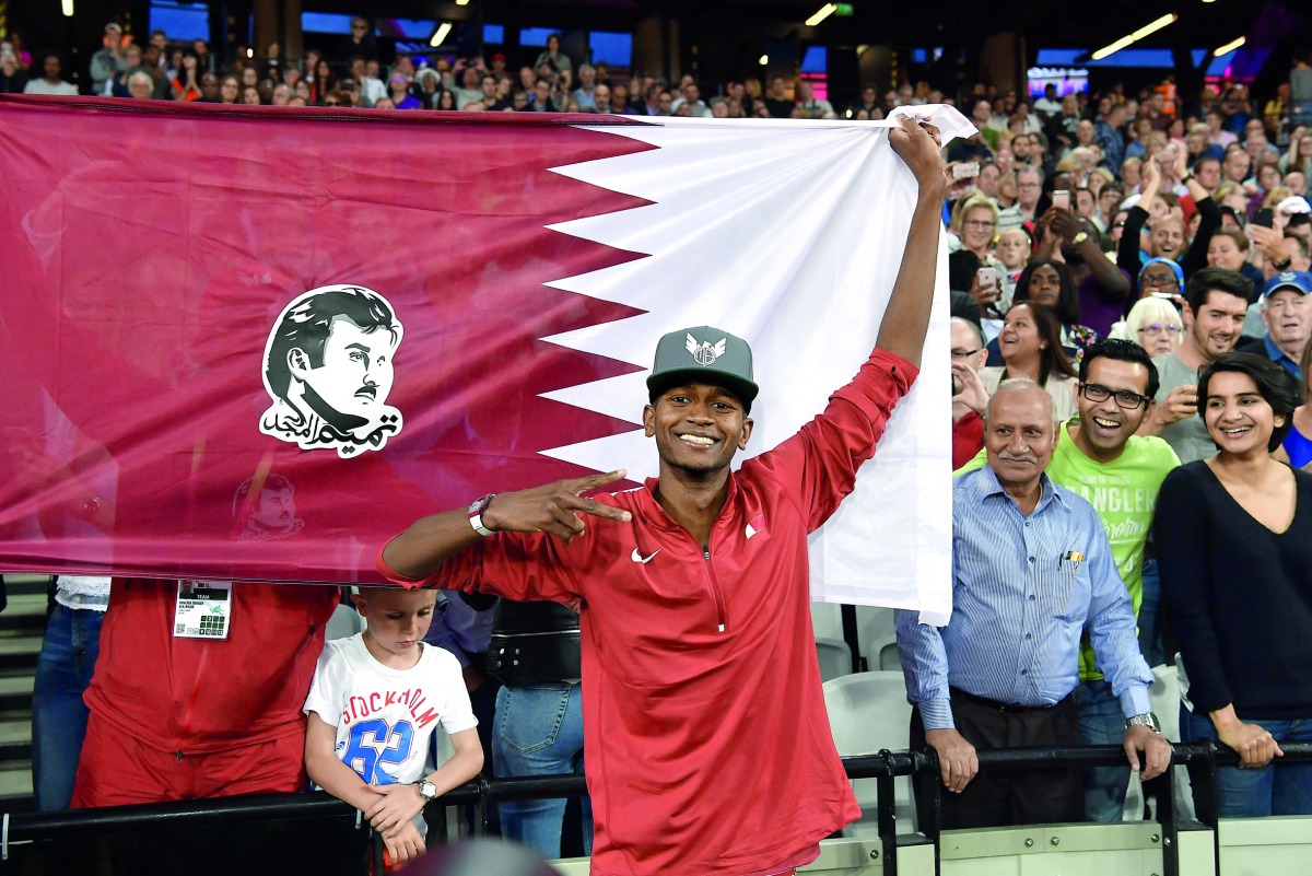 Qatar’s gravity-defying high jumper Mutaz Essa Barshim celebrates after winning the gold during the IAAF World Championships at the London Stadium in London, United Kingdom, yesterday. Barshim won the high jump gold with a winning leap of 2.35 metres to e