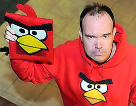 Chief Marketing Officer and Co-founder of Rovio Entertainment Oy, Peter Vesterbacka, dressed in a red ‘Angry Birds’ sweater poses with an ‘Angry Birds’ iPad case, in this file photo. 