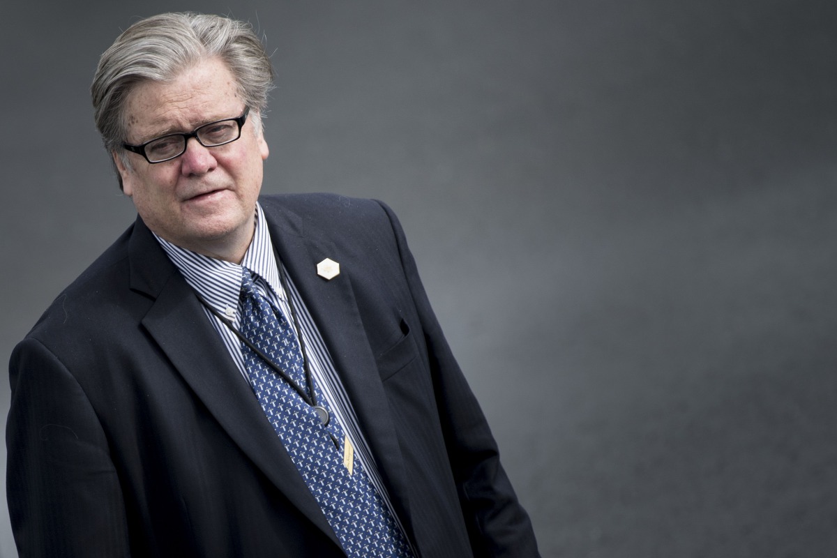 This file photo taken on May 13, 2017 shows trategist Steve Bannon waiting while US President Donald Trump arrives at Lynchburg Regional Airport May 13, 2017 in Lynchburg, Virginia. AFP / Brendan Smialowski
