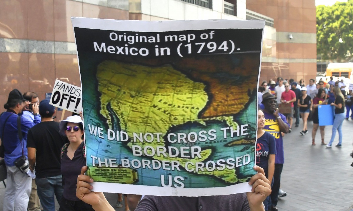 A map of Mexico as it was in 1794 is displayed as young immigrants and their supporters rally in support of Deferred Action for Childhood Arrivals (DACA) in Los Angeles, California on September 1, 2017. A decision is expected in coming days on whether US 