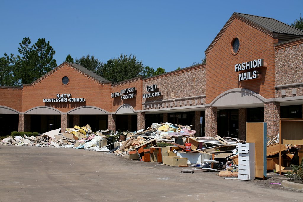 Mitigated flood damaged contents of a small business complex waits to be carted away following the aftermath of tropical storm Harvey in Katy, Texas, U.S., September 9, 2017. REUTERS/Mike Blake
