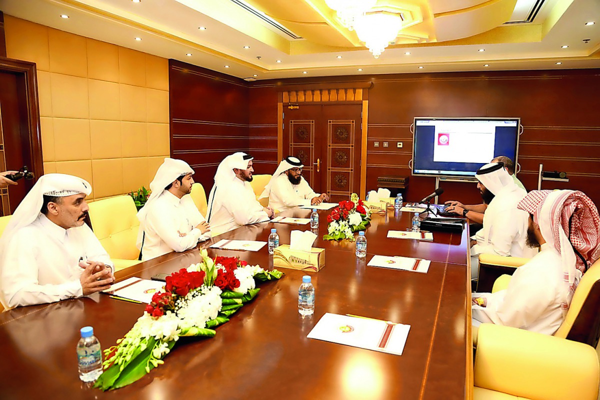 Minister of Awqaf and Islamic Affairs H E Dr Ghaith bin Mubarak Al Kuwari with officials at the launch of the programmes.