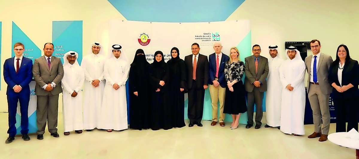 The officials of the Hamad Bin Khalifa University (HBKU) with the Ministry of Justice’s Legal and Judicial Studies Center during the MoU signing ceremony. 