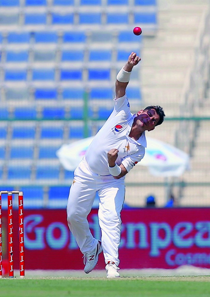 Pakistan’s Yasir Shah bowls during the opening day of first Test against Sri Lanka in Abu Dhabi  yesterday. 