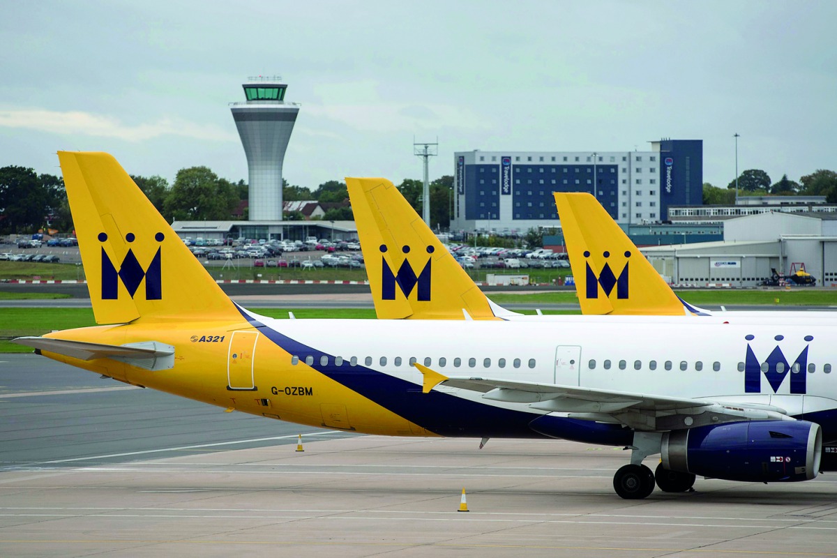 Monarch Airlines aircraft are pictured on the tarmac at Birmingham Airport in Birmingham, central England on October 2, 2017.  AFP / Oli Scarff