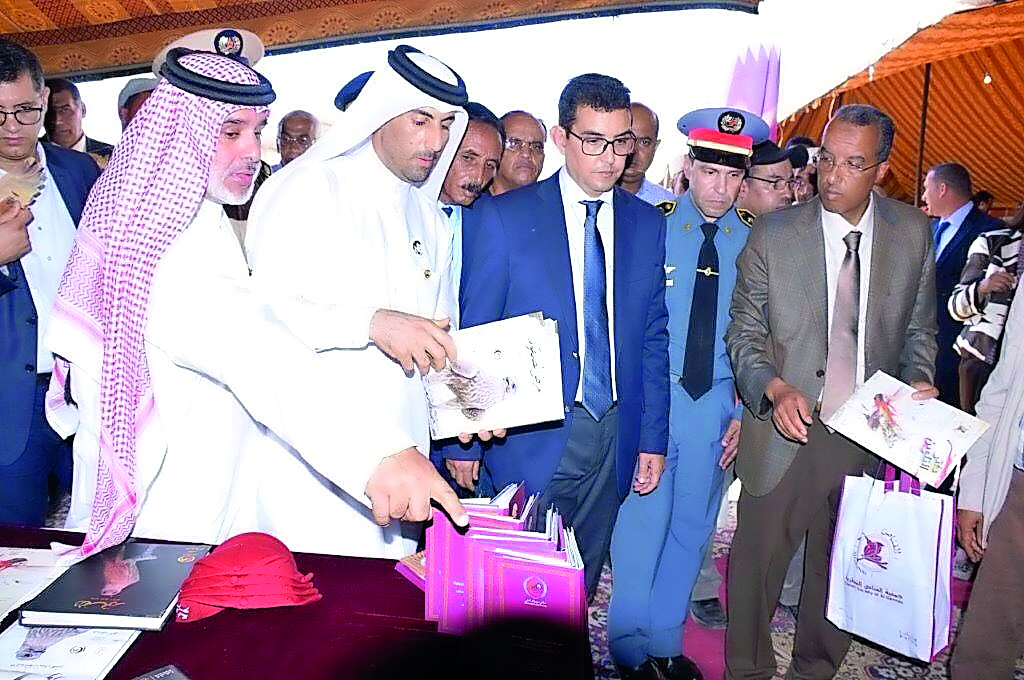 Ali bin Khatem Al Mihshadi (second left), Chairman of Al Gannas Society, and Mohammed bin Abdullatif Al Misnad (third left), Vice-Chairman of Al Gannas Society, at the fifth international falconry festival which concluded yesterday in Morocco.