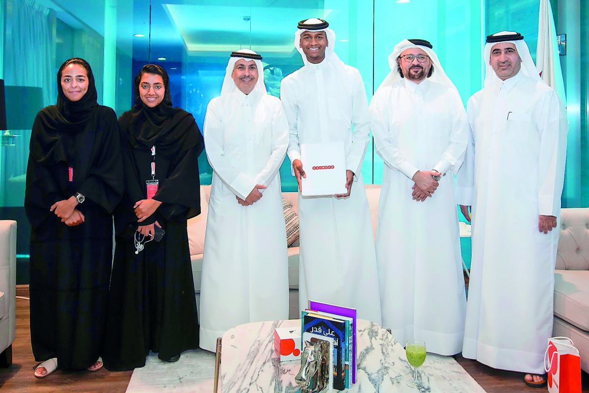 Mutaz Barshim, a gold medal winner at the 2017 World Championships poses for a picture with Ooredoo’s Chairman Sheikh Abdulla bin Mohammed bin Saud Al Thani and a host of senior Ooredoo management officials during a function held by Ooredoo to recognise t