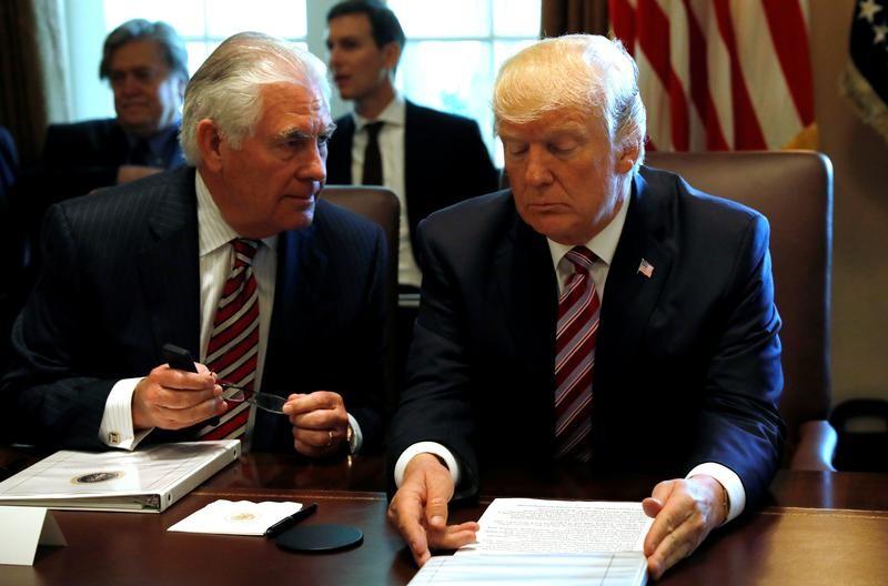 U.S. President Donald Trump talks with Secretary of State Rex Tillerson during a meeting with members of his Cabinet at the White House in Washington, U.S., June 12, 2017. Reuters/Kevin Lamarque 