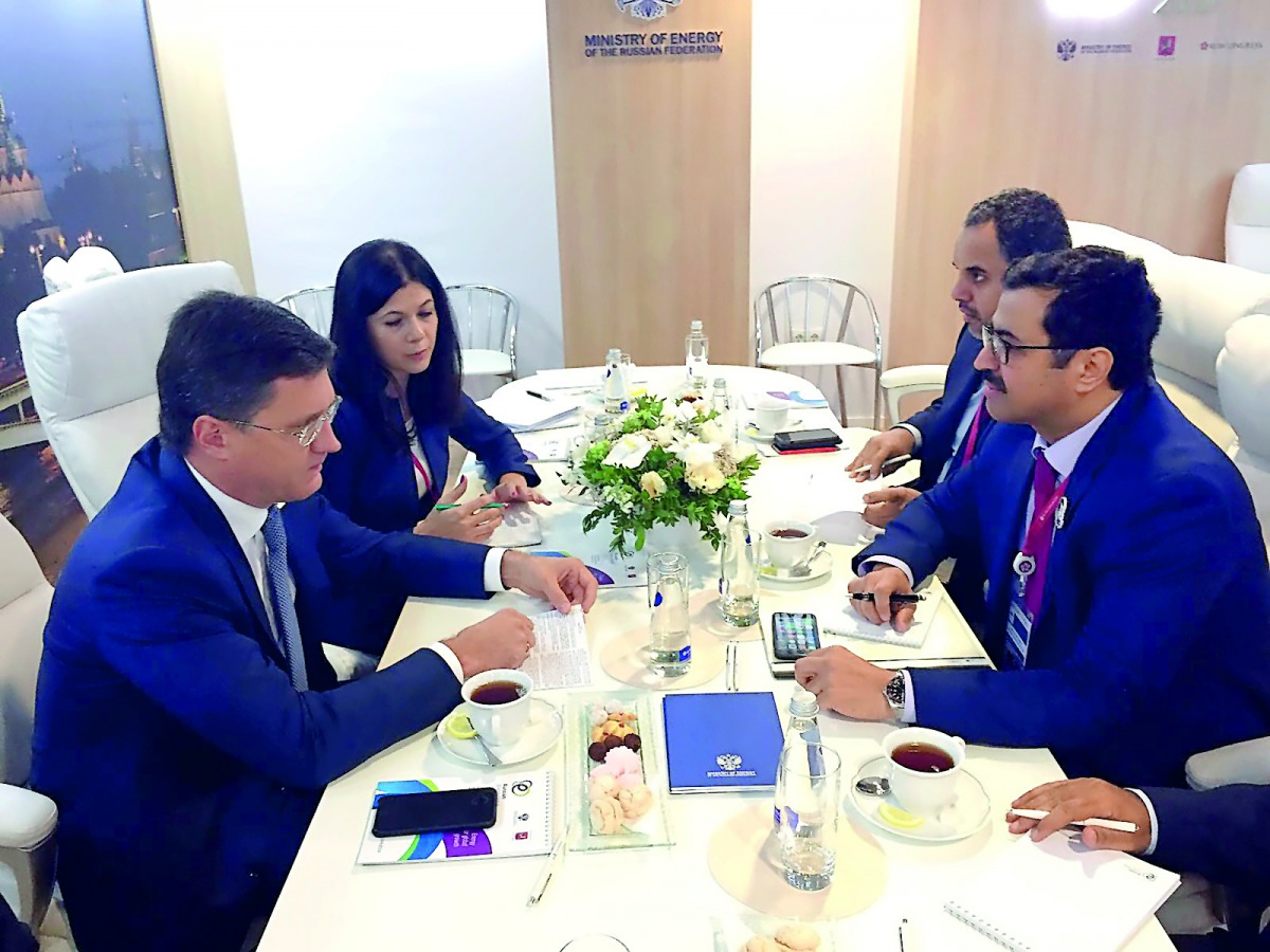 H E Dr Mohammed bin Saleh Al Sada (right), Minister of Energy and Industry, discussing bilateral cooperation with his Russian counterpart Alexander Novak in Moscow.