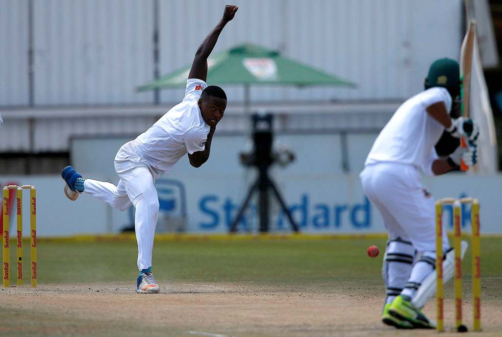 South Africa's bowler Kagiso Rabada (L) delivers a ball to Bangladesh Mahmudullah to take his 100th Test match wicket during the third day of the second Test cricket match between South Africa and Bangladesh in Bloemfontein on October 8, 2017. (AFP / MARC