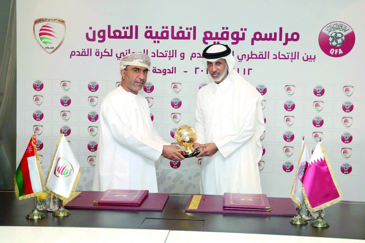 Sheikh Hamad bin Khalifa bin Ahmed Al Thani, President of the QFA and Sheikh Salim Al Wahaibi, President of the Oman Football Association (OFA) during the signing ceremony at QFA’s headquarters at Al Bidda Tower yesterday.