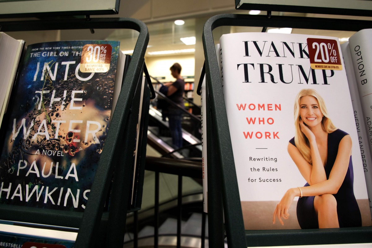 A woman walks past a shelf displaying the book 'Women Who Work: Rewriting the Rules for Success' by Ivanka Trump at a Barnes and Nobel bookstore in New York on May 2, 2017 (AFP / Jewel Samad) 
