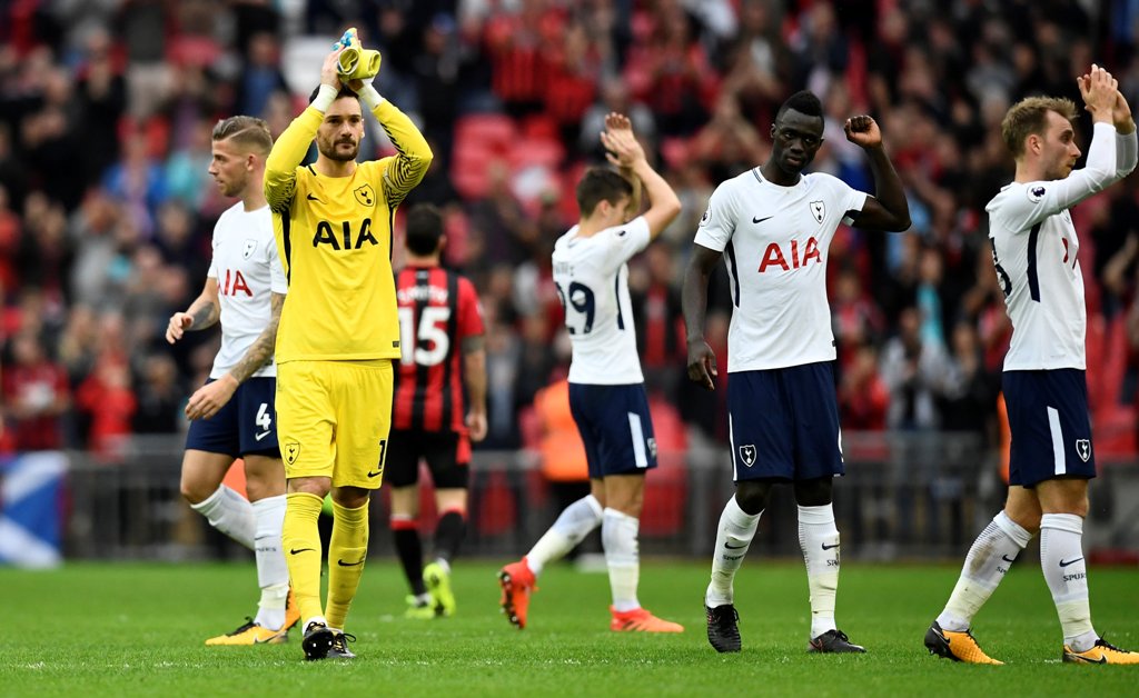  Tottenham's Christian Eriksen, Hugo Lloris and Harry Winks applaud the fans at the end of the match as Davinson Sanchez celebrates REUTERS/Dylan Martinez