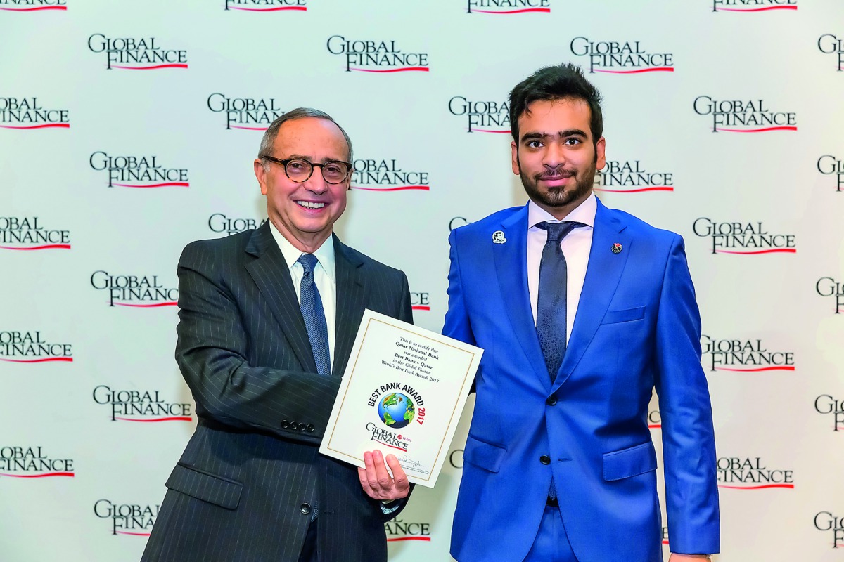 QNB official receiving ‘Best Bank in Qatar 2017’ award in Washington DC.