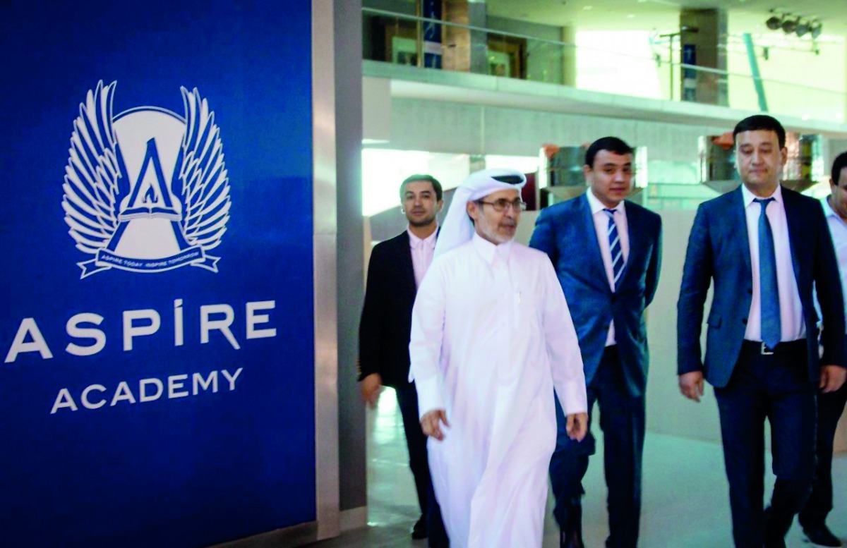 President of Uzbekistan Football Federation (UFF), Umid Ahmadjonov is seen with Director General, Ivan Bravo, and Deputy Director General, Ali Salem Afifa, during his visit to the Aspire Academy in Doha.