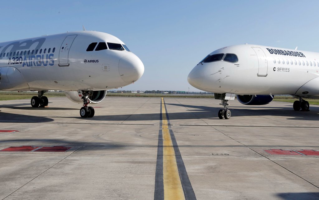 An Airbus A320neo aircraft and a Bombardier CSeries aircraft are pictured during a news conference to announce a partnership between Airbus and Bombardier on the C Series aircraft programme, in Colomiers near Toulouse, France, October 17, 2017. REUTERS/Re