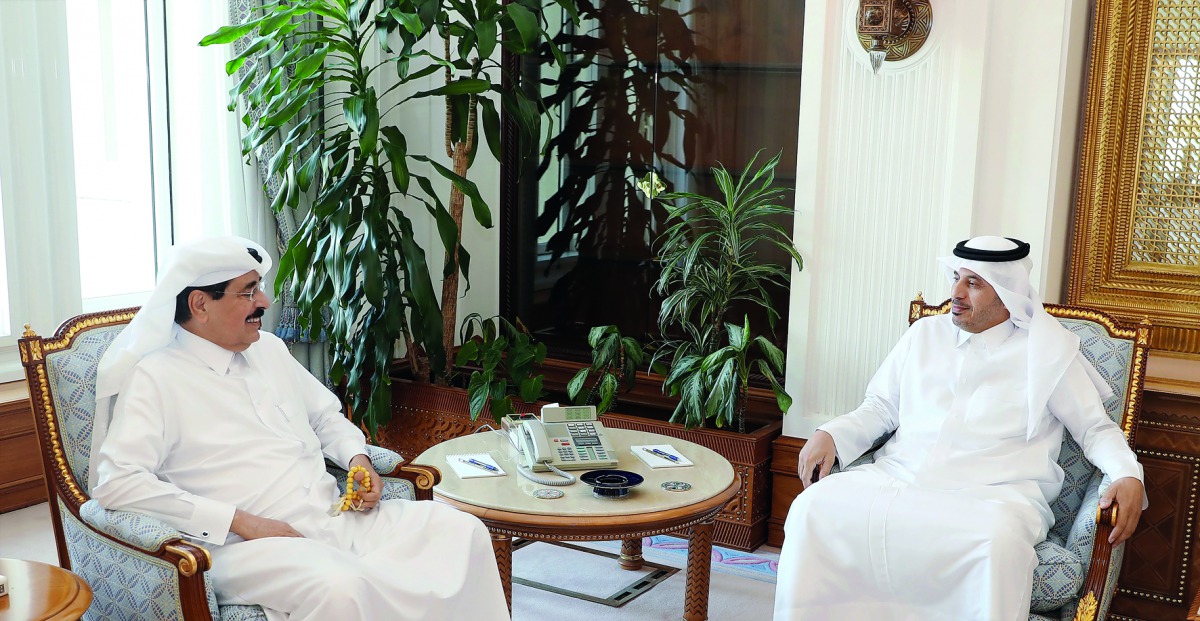 Prime Minister and Interior Minister H E Sheikh Abdullah bin Nasser bin Khalifa Al Thani with H E Dr. Hamad bin Abdulaziz Al Kawari in Doha yesterday. 