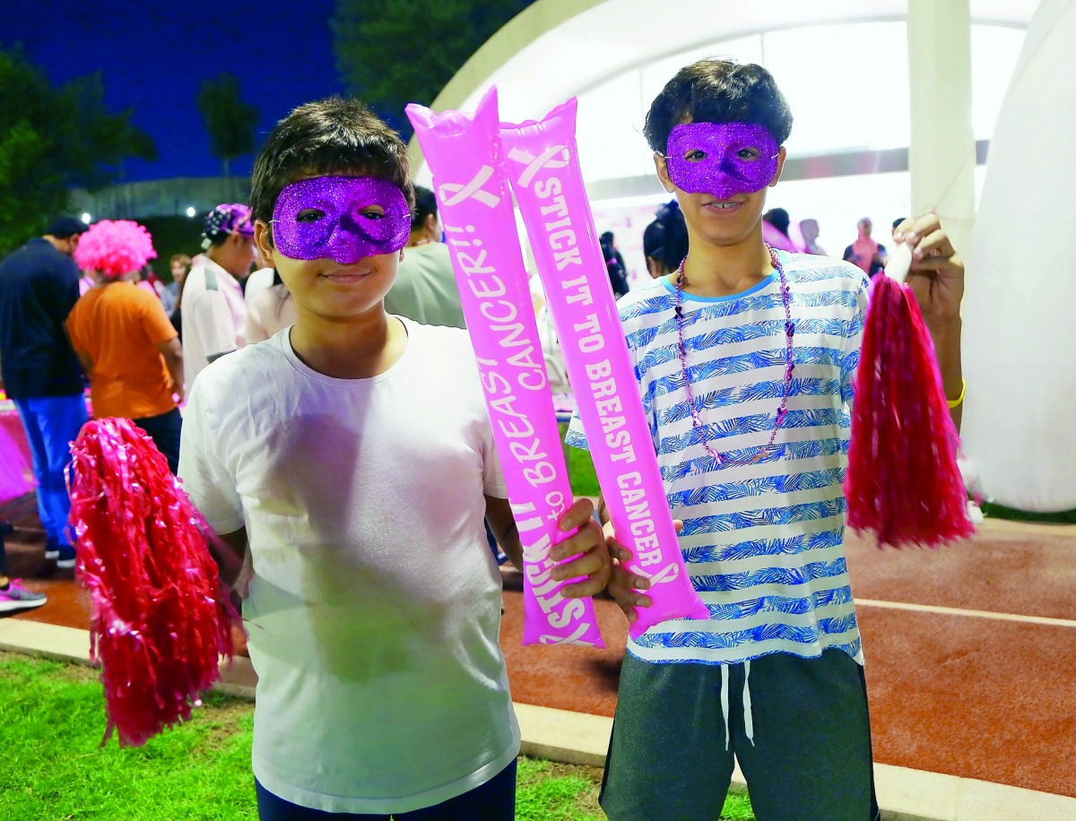 Families participate in Qatar Foundation’s breast cancer awareness walk in Oxygen Park, Education City.