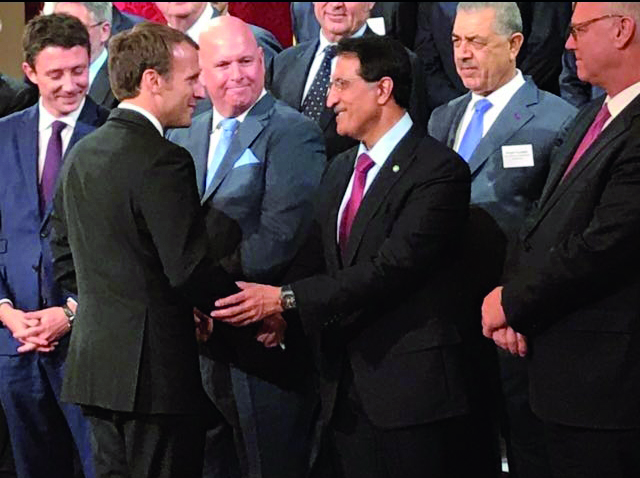 Chief Executive Officer of Qatar Investment Authority (QIA), H E Sheikh Abdulla bin Mohammed bin Saud Al Thani, greets others at the Global Forum on Investment organised by BlackRock Asset Management in Paris in collaboration with the French government. 