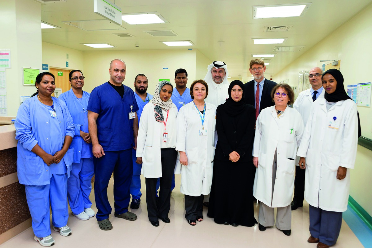 Minister of Public Health, H E Dr Hanan Mohamed Al Kuwari, with the transplant team.