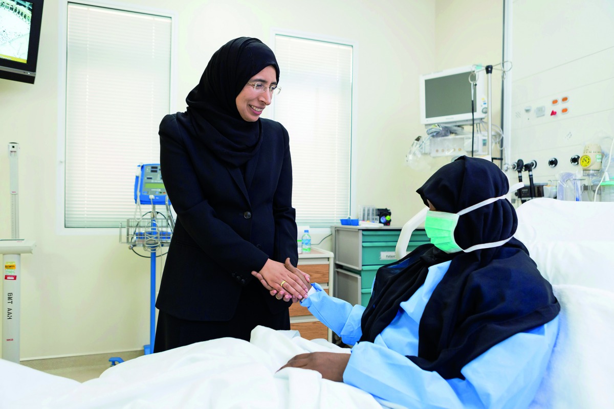 Minister of Public Health H E Dr Hanan Mohamed Al Kuwari visiting a stem cell transplant patient.
