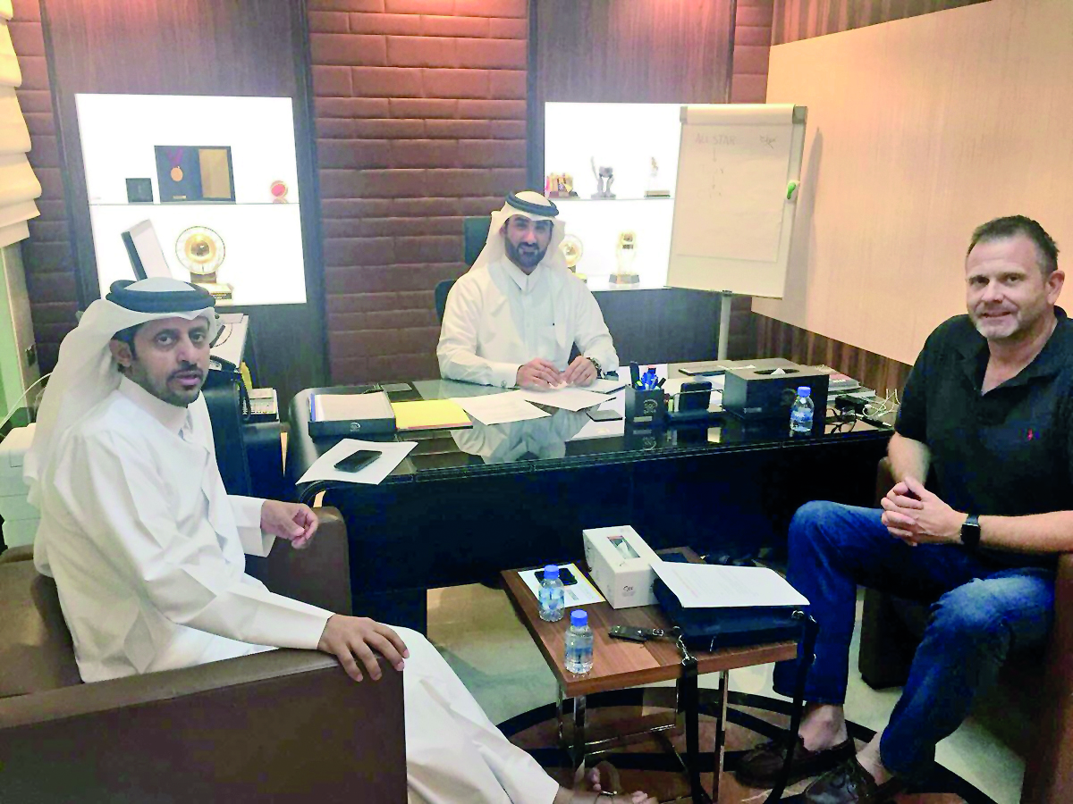 Qatar’s new coach Tim Lewis (right) during his meeting with QBF President Ahmad Al Muftah and the Chairman of the National Teams Committee Abdul Rahman Al Hitmi on Sunday.