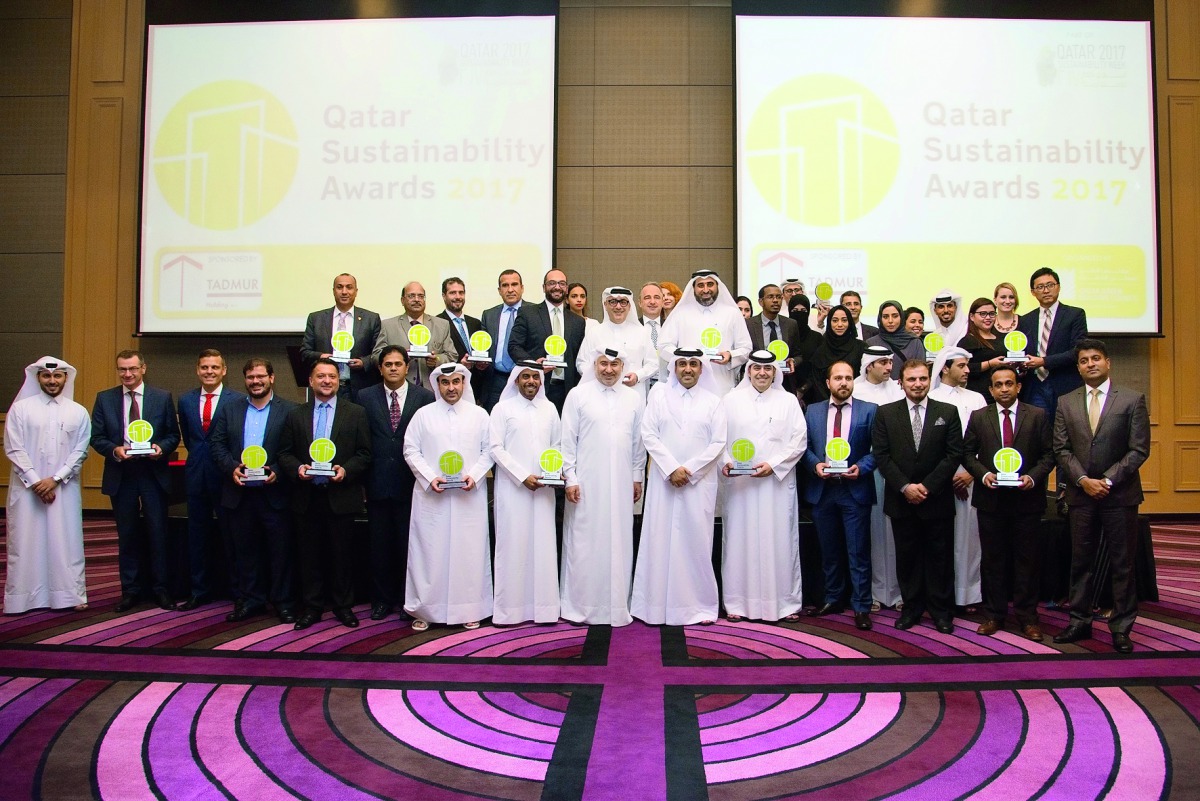 The winners of Qatar Sustainability Awards with officials during the ceremony. 