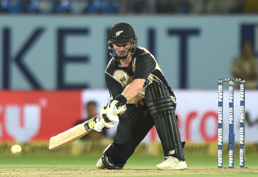 New Zealand batsman Colin Munro plays a shot during the second T20 international cricket match between India and New Zealand at the Saurashtra Cricket Association Stadium in Rajkot on November 4, 2017. GETTYOUT / AFP / PUNIT PARANJPE 