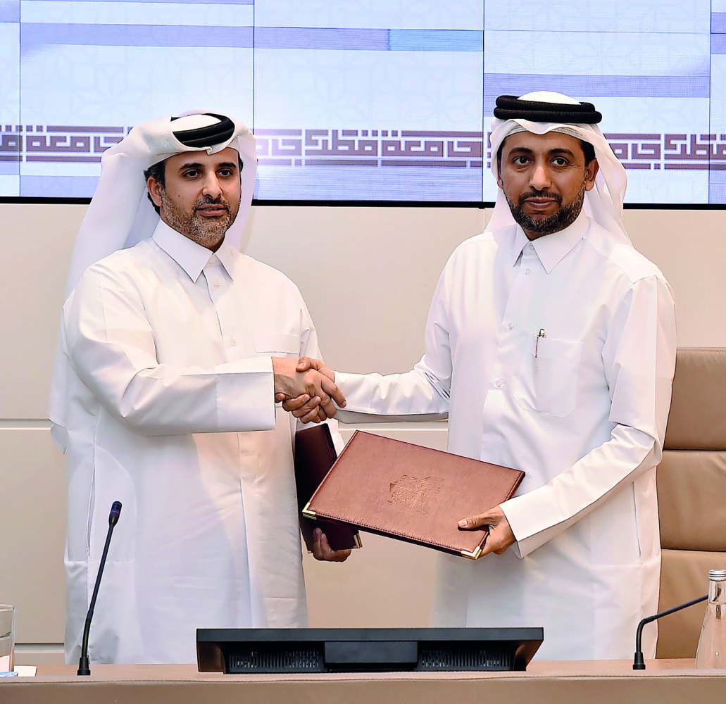 QU President Dr Hassan Al Derham (right) and Qatar Rail Managing Director and CEO Eng Abdulla Abdulaziz T Al Subaie during the signing ceremony. 