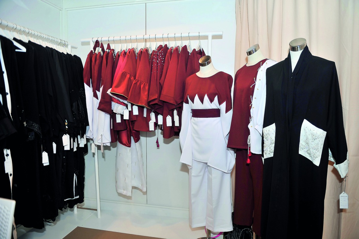 Qatari Flag coloured garments at 12th Heya Arabian Fashion Exhibition which is taking place at DECC. Pic: Baher Amin / The Peninsula