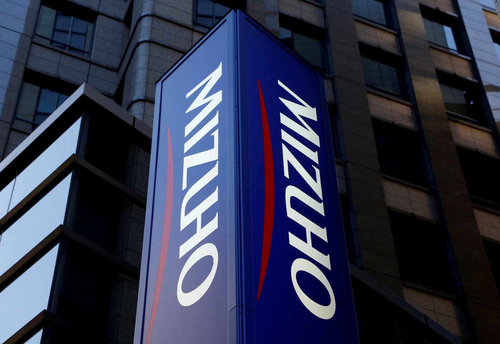 Mizuho Bank's signboard is pictured in Tokyo, Japan, January 25, 2017. REUTERS/Kim Kyung-Hoon/File Photo
