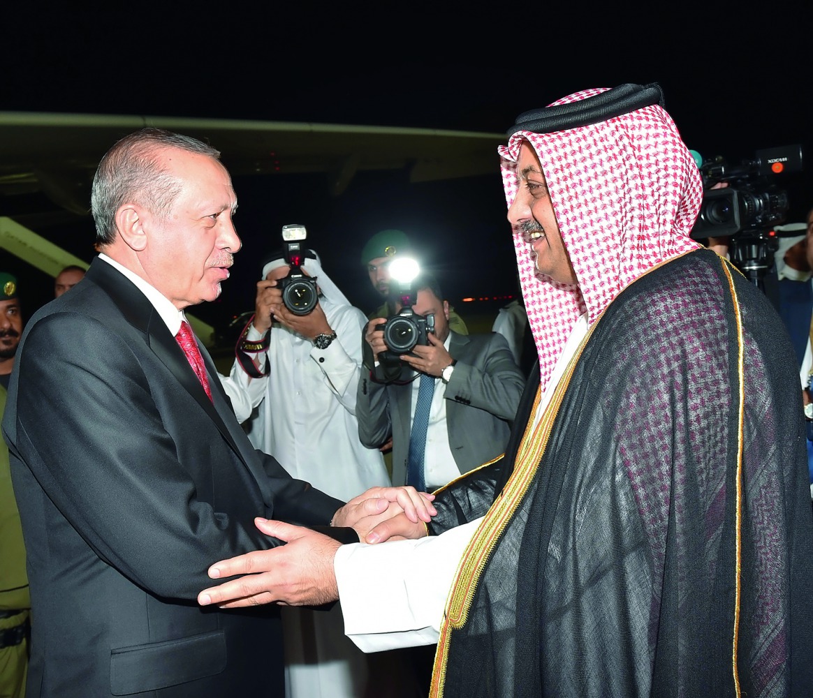 Deputy Prime Minister and Minister of State for Defence Affairs H E Dr Khalid bin Mohamed Al Attiyah receiving President of the fraternal Republic of Turkey, Recep Tayyip Erdogan, upon his arrival at Hamad International Airport yesterday. Qatar’s Ambassad