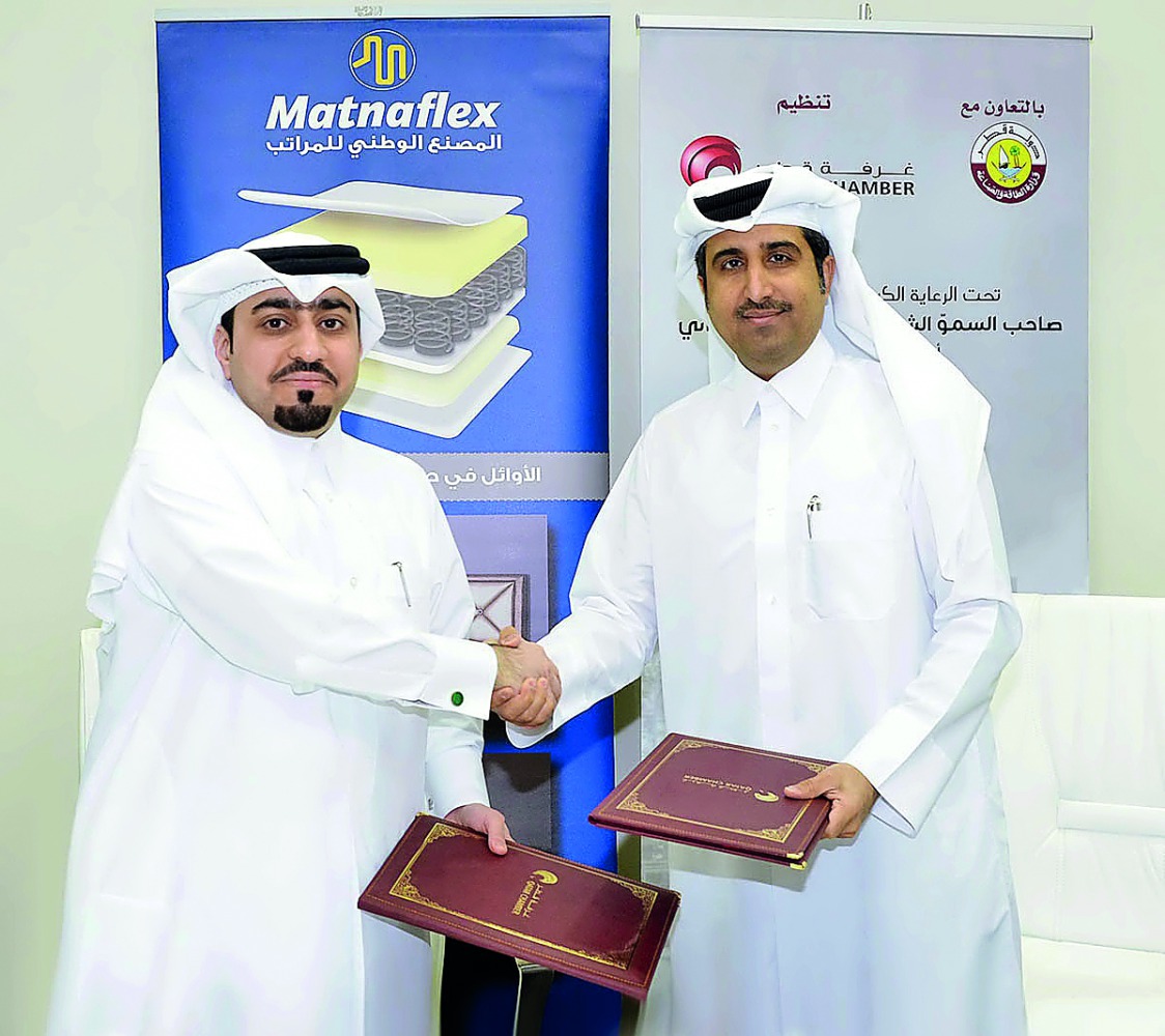 Saleh bin Hamad Al Sharqi (right), QC Director General; and Fahd Al Emadi, Matnaflex CEO shaking hands after signing the sponsorship agreement, on Thursday.