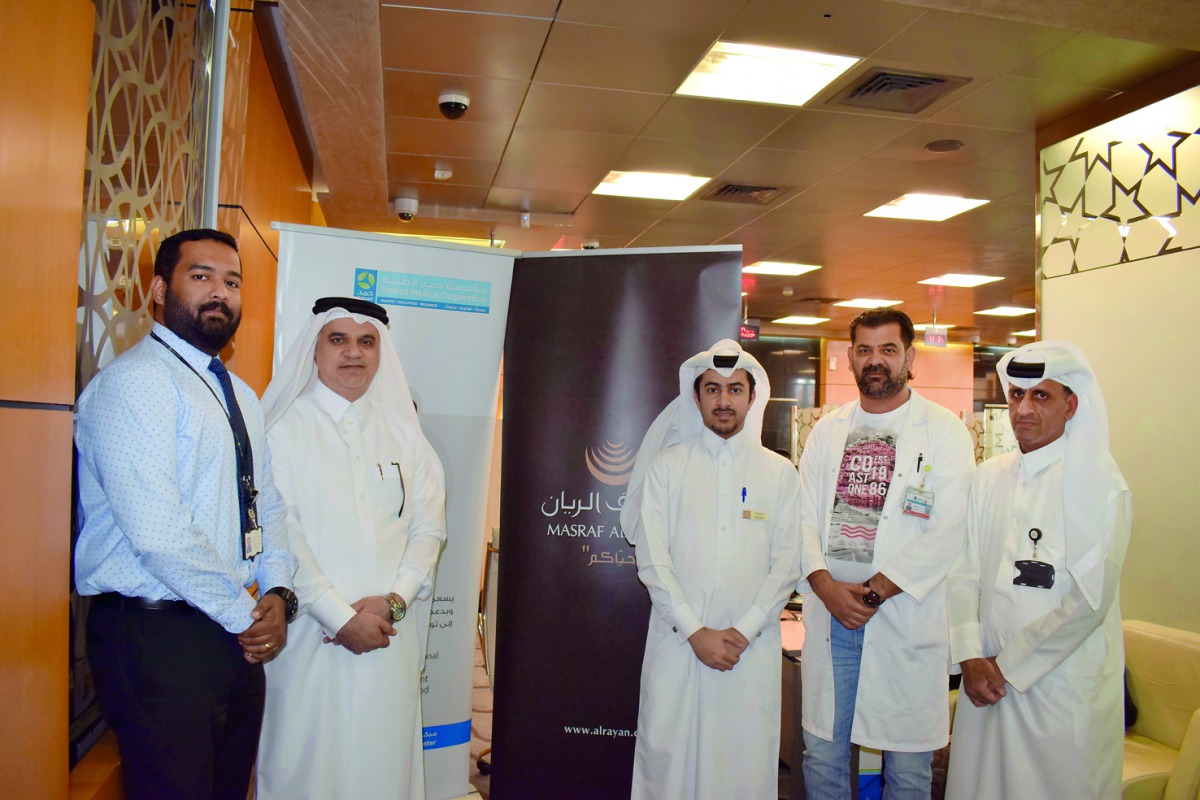 Officials and other representatives during the blood donation campaign organised by Masraf Al Rayan in collaboration with the Blood Donation Unit at Hamad Medical Corporation  at the bank’s head office, yesterday. 