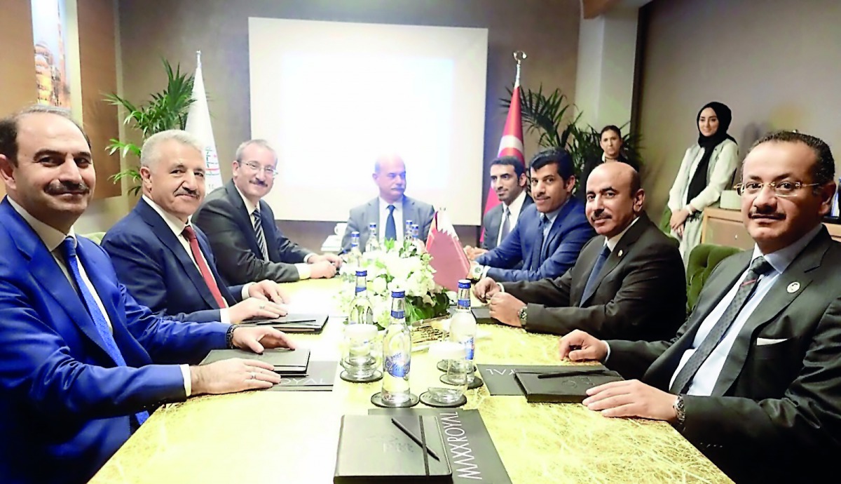 Minister of Transport and Communications H E Jassim bin Saif Al Sulaiti with Turkish Minister of Transport, Marine Affairs and Communications, Ahmet Arslan, at the launch of e-commerce platform Turkish Souq, yesterday. 