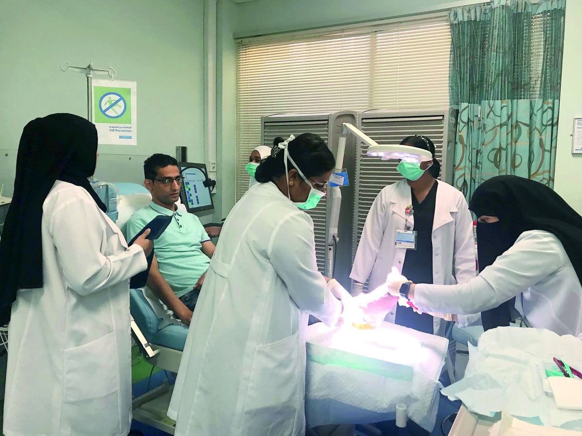 Doha resident, Haikel Lachiheb receives a specialised care from HMC’s dedicated Wound Care Unit staff.