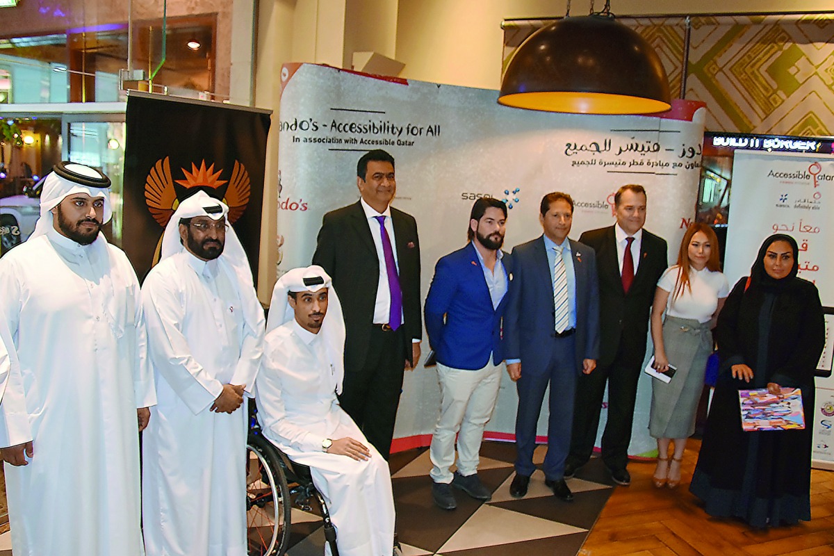 Prof. Shirish Soni, Ambassador Extraordinary and Plenipotentiary of South Africa to Qatar, senior management of Sasol and Nando’s, Accessible Qatar initiative ambassadors and members from the community attending the function.